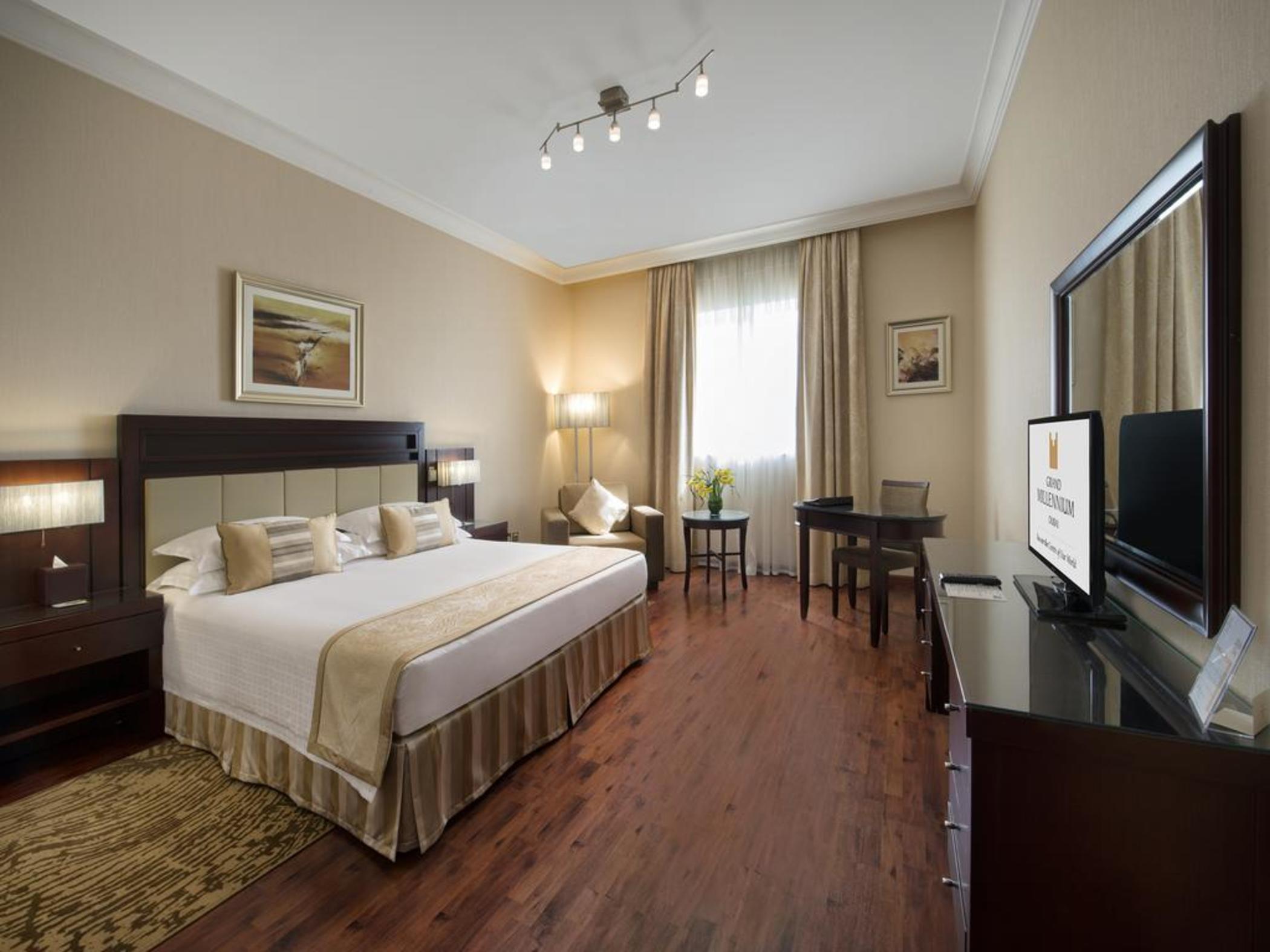 Grand Millennium Dubai Hotel Exterior foto A room at the hotel